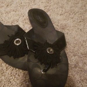 Black coach flip flops